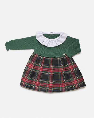 Girls will love wearing this Juliana branded knitted dress. It has a stylish moss green color, a checkered print along the bottom, and white frill collars that's sure to stand out. With comfortable and easy access buttons on the back, this dress is perfect for special occasions such as Christmas and everyday wear. Available in sizes from 3 months to 4 years.