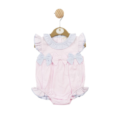 Introducing the perfect summer outfit for your little girl! This girls pink romper by baby boutique brand Mintini Baby features short sleeves, a cute three bow detail across the middle, and frilly details on the shoulders and around the legs. With a button fastening on the rear, this romper offers both style and convenience. Available in sizes 3 months to 12 months.