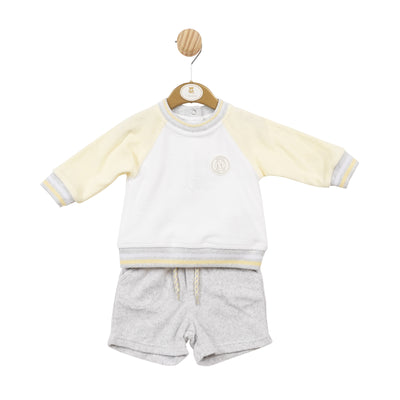 <p>Introducing our boys white, lemon &amp; grey sweatshirt and shorts Set from Mintini Baby's spring summer collection. This two piece set includes a round neck sweatshirt with white and lemon colourblock sleeves and grey shorts to match. Available in sizes 3 months to 24 months. Perfect for your little ones to stay stylish and comfortable this season.</p>