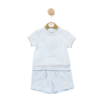 This boys blue two piece shorts & T-shirt set from Mintini Baby is the perfect addition to your little one's wardrobe. Made with comfortable elasticated waistband shorts and a soft, round neck t-shirt with white and grey piping details, this set is both stylish and functional. Available in sizes from 3 months to 5 years.