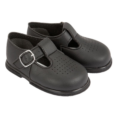 Black faux leather 'Baypods' first walker shoes. Made in England, these smart, traditionally styled shoes are the perfect choice for babies and toddlers. They have buckle fastening straps to keep securely on little feet and rounded shaped toes for correct foot development. . Faux leather uppers Textile lining Wipe clean Buckle strap Shoes suitable for girls and boys