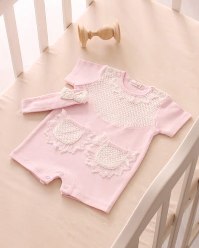 <p>Introducing the Leo King branded baby girls pink romper set. Made with soft cotton material, this onesie features a frilly collar, button closure on the back and between the legs, and comes with a matching headband. Available in sizes 1-3m, 3-6m, 6-9m and 9-12m to keep your little one stylish and comfortable.</p>