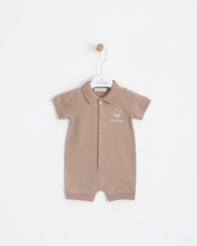 <p>Introducing Leo King's baby boys beige short sleeve romper - the perfect spring/summer outfit for your little one! This high-quality, branded romper features a button down front and collar detail, providing both style and functionality. Available in sizes 1-3 months up to 9-12 months, this beige romper is a must-have for your baby boy's wardrobe.</p>
