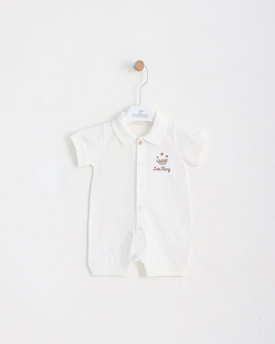 <p>Introducing the must-have Leo King branded white short sleeve romper for baby boys - a stylish and functional outfit perfect for spring and summer. This high-quality branded romper includes a button down front and collar detail and is available in sizes 1-3 months up to 9-12 months, ensuring your little one stays fashionable and comfortable all season long.</p>