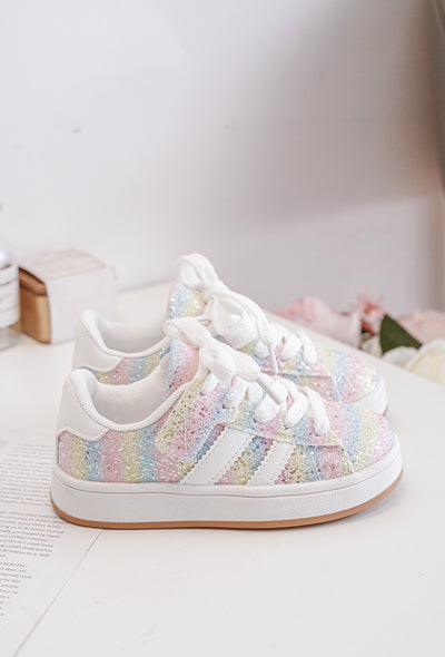 These beautiful, multi-coloured girls trainers feature rainbow glitter detailing and a trendy gum sole, perfect for adding a touch of style to any outfit. The lace-up fastening ensures a secure fit, making them ideal for active girls. Available in sizes infant 3 up to junior size 3, these fashion trainers are a must-have for the spring-summer collection.