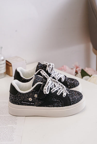 Introducing our new girls chunky sole black glitter lace up fashion trainers! These trendy shoes are perfect for the spring and summer season with their chunky sole design. The white shoe lace up fastening adds both style and functionality. Available in sizes infant 8 up to junior size 3.