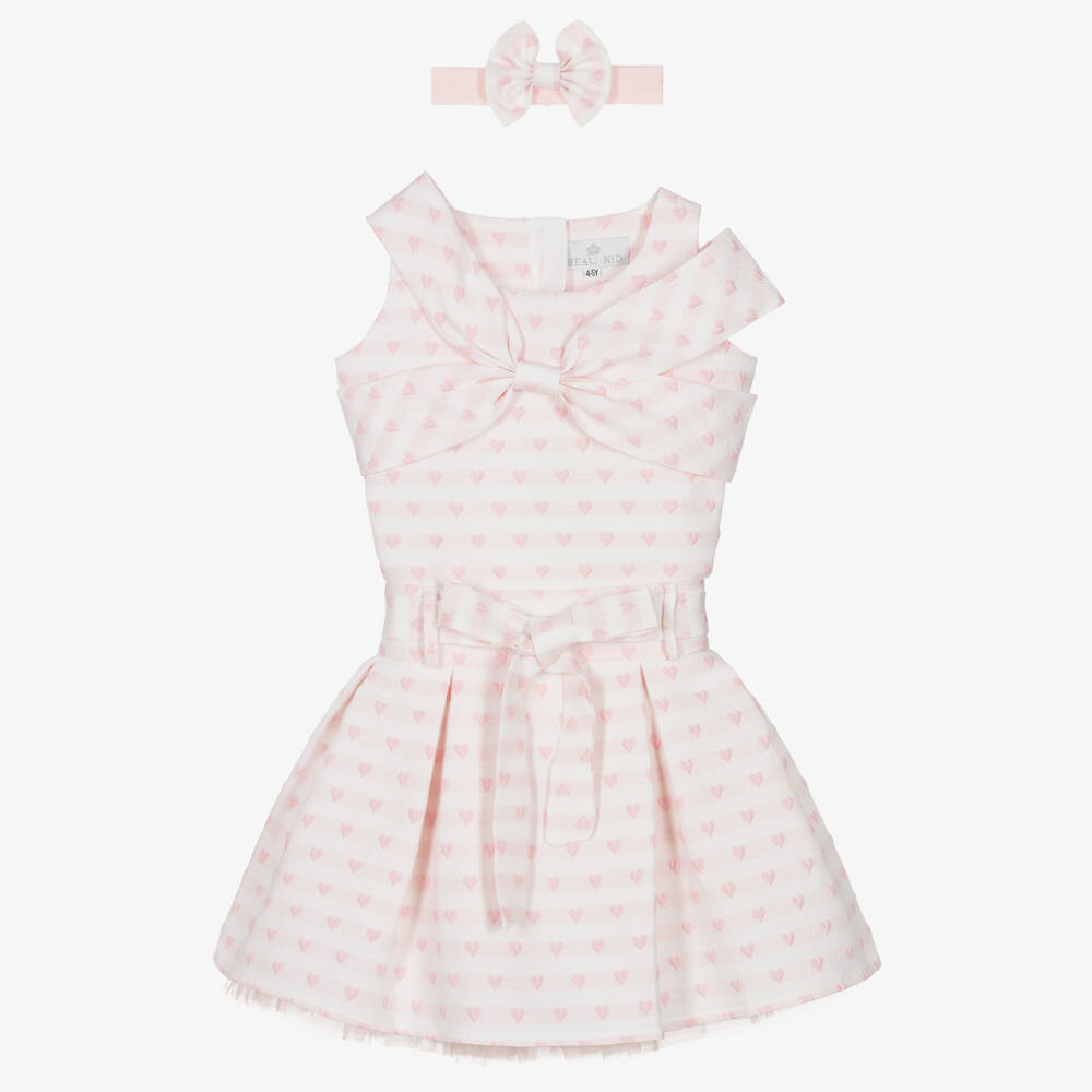 Front view of the Beau Kid girls pink 2-piece set featuring a short-sleeved jersey top with a large central heart appliqué and a matching multi-layered tulle ruffle skirt.