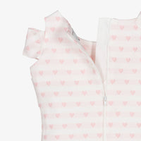 Rear view of the Beau Kid pink girls top highlighting the simple jersey construction and the single button and loop fastening at the neckline.