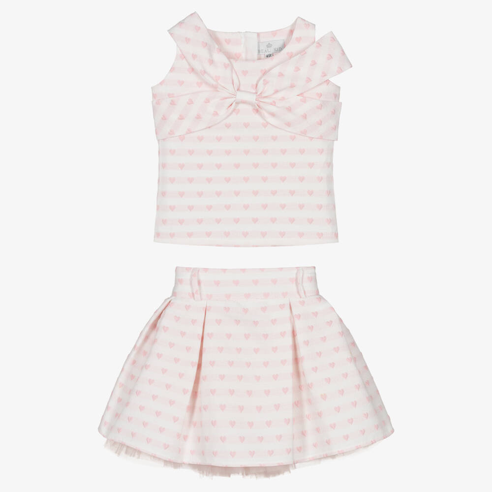 Full flat-lay studio shot of the Beau Kid pink girl’s set, showcasing the heart-detailed jersey top and the high-volume tiered tulle ruffle skirt.