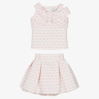 Full flat-lay studio shot of the Beau Kid pink girl’s set, showcasing the heart-detailed jersey top and the high-volume tiered tulle ruffle skirt.