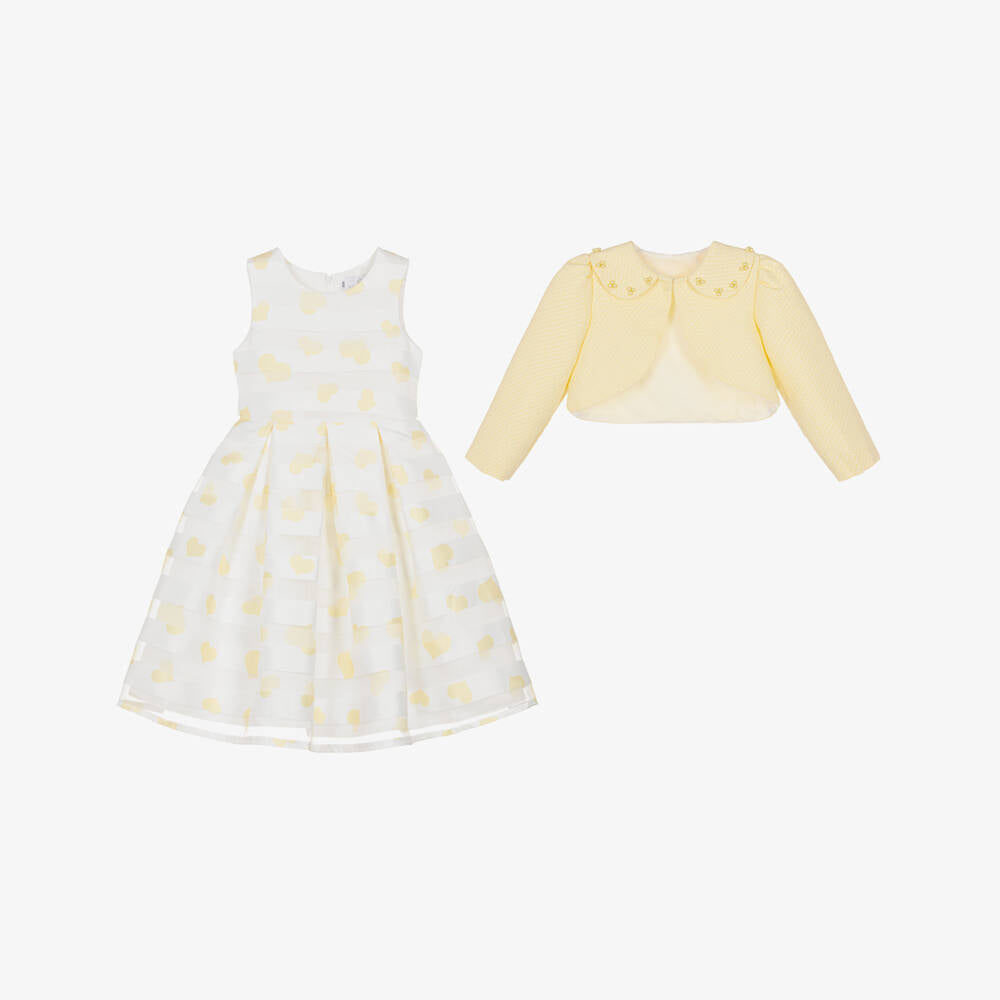 Back view of the Beau Kid girls sleeveless lemon dress showing the structured box pleats and the secure concealed zip fastening for a seamless finish.