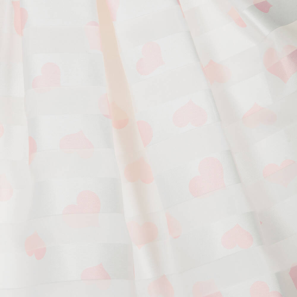 Detailed back view of the Beau Kid pink jacquard bolero jacket, highlighting the high-quality woven texture, short sleeves, and delicate ruffle trim.
