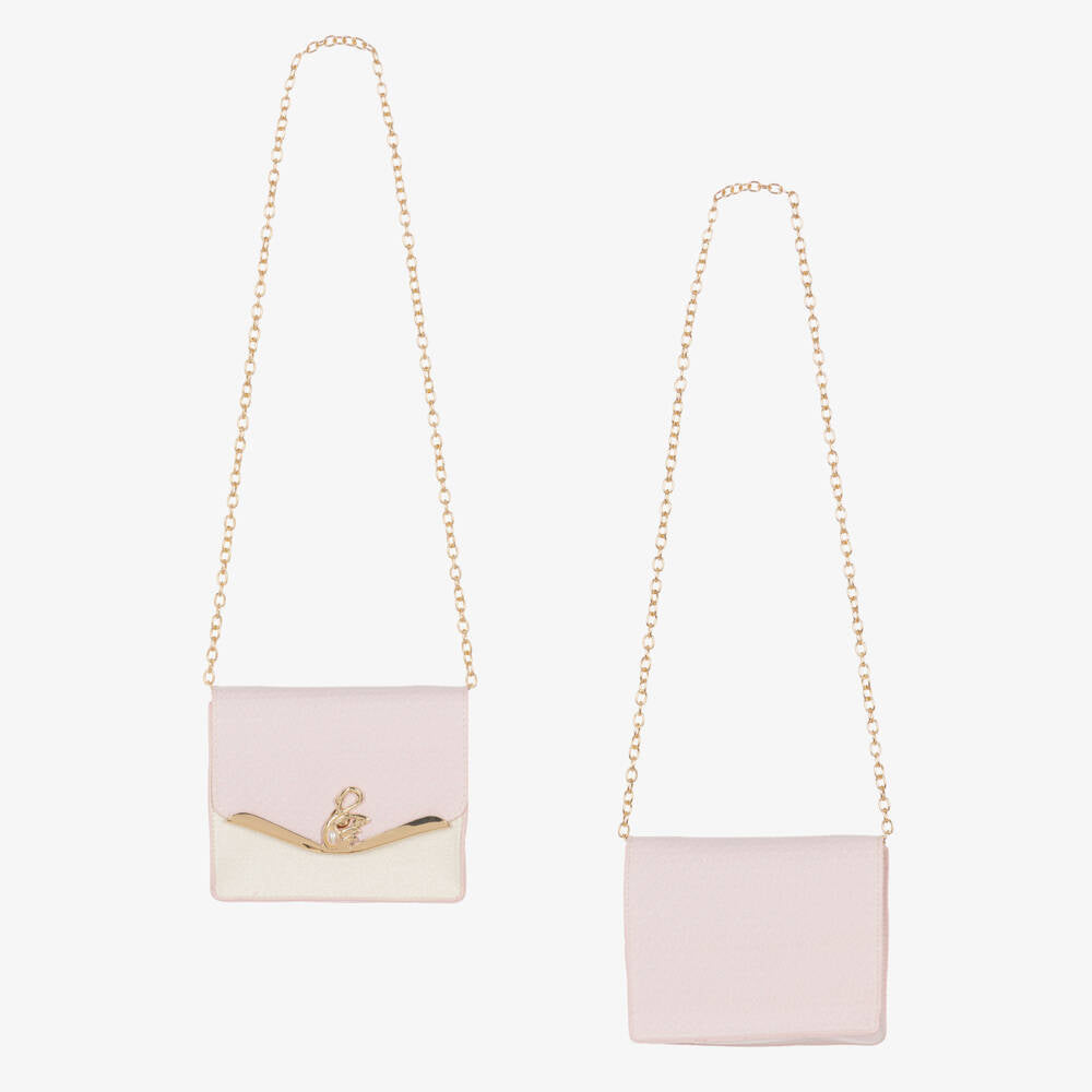 Rear view of the Beau Kid sleeveless pink dress, displaying the structured box pleats and the secure, concealed zip fastening for a seamless boutique finish.