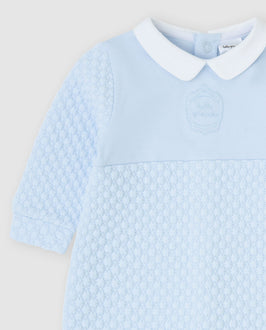 tutto piccolo boys sky blue quilted babygrow peter pan collar and embroidered crest close up