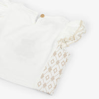 Side profile view of the Beau Kid camel and white boys outfit, showcasing the clean, smart-casual silhouette and the high-quality finish of the cotton-blend fabric.