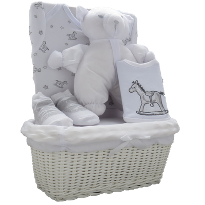 Experience luxury with our unisex baby white five piece basket gift set. Made with the highest quality materials, this Amore branded set includes a bodysuit, bib, socks, soft toy, and rattan basket. Perfect for ages 0-3 months, this set is sure to impress any parent. Perfect gift idea for a unisex baby shower or newborn baby gift.