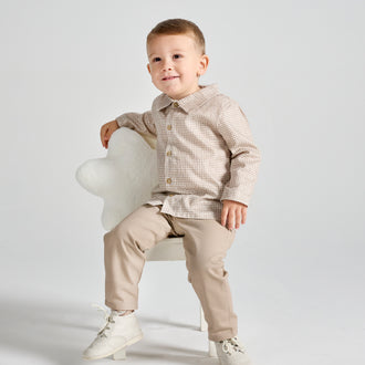 rapife boys brown check shirt beige trousers set model sitting front view