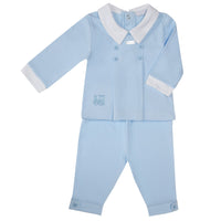 This fashionable boys blue two piece top & trouser set by Amore offers a unique look that your child will love. The set features a blue two-piece outfit with train embroidery, perfect for any special occasion. With its comfortable design and quality material, this outfit provides a stylish and comfortable look for your boy. Available in sizes 0-3 month up to 18-24 month.