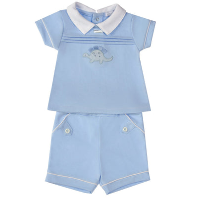 <p data-mce-fragment="1">This boys blue dinosaur top and shorts set from our Amore branded spring summer collection is perfect for your little explorer. The playful dinosaur motif on the front adds a fun touch, while the white collar detail adds a touch of sophistication. Available in sizes 0-3 months up to 18-24 months.</p>