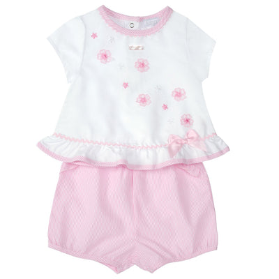 <p data-mce-fragment="1">This Amore branded, two piece outfit is perfect for your little girl's spring and summer wardrobe. The white top features delicate flower embroidery and a cute bow detail, while the pink shorts complete the look. The round neck collar with pink piping adds a touch of charm. Available in sizes 0-3 months to 18-24 months.</p>