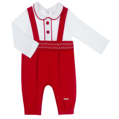 Introducing our new boys white &amp; red smocked dungaree, a must-have for your little one this season. This baby boys outfit features a red smocked dungaree paired with a white long sleeve peter pan collar shirt, complete with red piping detail and buttons. As part of our autumn winter collection, this Amore branded ensemble is perfect for special occasions like Christmas. Available in sizes 0-3 months to 18-24 months.