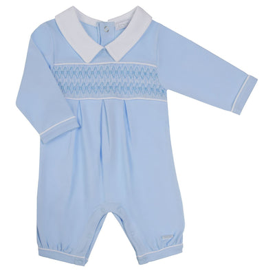 Introduce your little one to the season in style with our new arrival boys blue smocked romper. This Amore branded piece features a classic blue colour with long sleeves, smock design, and white collars for a timeless look. Available in sizes 0-3 month, 3-6 month, and 6-9 month. Perfect for the autumn/winter season.