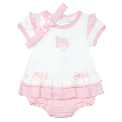 This adorable Amore branded romper is perfect for your baby girl's spring and summer wardrobe. The white and pink colours, along with the rainbow motif and bows, make it both playful and stylish. The frill around the bottom adds a cute touch, and the matching headband completes the look. Available in sizes 0-3 months up to 6-9 months.