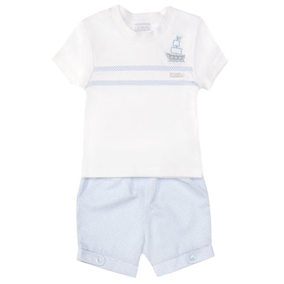 This two-piece set by Amore features a white round neck t-shirt with a ship motif on the side and two blue stripes across the chest, paired with matching blue shorts. Perfect for little boys, sizes 0-3 months up to 18-24 months. Add a touch of style to your child's wardrobe with this nautical-inspired look.