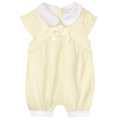 Introducing the perfect addition to your little girl's spring and summer wardrobe - our girls lemon romper with bow detail. Featuring a beautiful lemon print, short sleeves, and delicate bow detail, this romper is both stylish and comfortable. Complete the look with a crisp white collar and piping detail. Available in sizes 0-3 months up to 6-9 months. From our Amore branded easter outfit collection.