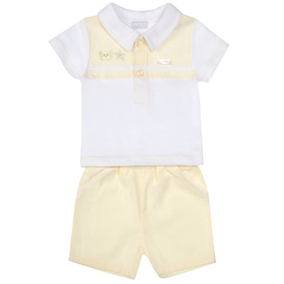 Upgrade your little one's wardrobe with the Amore boys lemon &amp; white polo shirt and shorts set. This two-piece set features a trendy lemon box design on the polo shirt and matching lemon shorts. Perfect for the spring/summer season and Easter celebrations. Available in sizes 0-3 months up to 18-24 months.