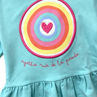 close up of agatha ruiz de la prada rainbow target embroidery on turquoise hoodie