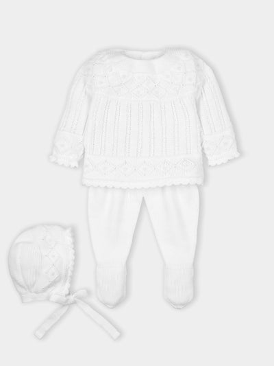 Mac Ilusion branded baby girls three piece knitted set finished in white. This set  consists of a knitted sweatshirt, closed feet trousers and a matching bonnet. Comes presented in a gift box, making it perfect for a new baby girl gift. Available in sizes 1 month, 3 month & 6 month.  Also available in Pink.  100% Acrylic 