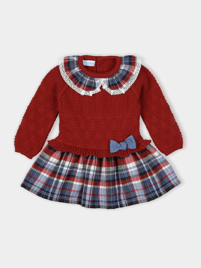 Mac Ilusion branded girls knitted winter dress finished in a red and navy checkered print. This dress is perfect for your little ones autumn/winter wardrobe, will also make a lovely Christmas Day outfit. Available in sizes 3 month up to 3 year old. Comes presented in a gift box.  100% Acrylic 
