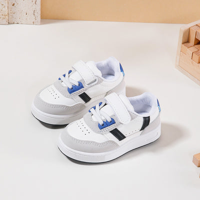 <p data-mce-fragment="1">These boys white &amp; black lace up trainers from the Rock &amp; Joy's spring summer collection are the perfect combination of style and practicality. The velcro fastening and lace up feature ensure a secure fit, while the blue detail adds a pop of colour. Your little one will love sporting these branded trainers for any occasion.</p>