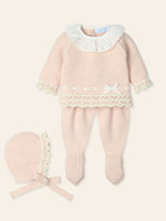 Introduce your little one to the autumn/winter season in style with this baby girls nude three piece knitted set by Spanish children's clothing brand, Mac Ilusion. This new arrival in our branded collection offers a cosy and chic outfit for your baby girl, featuring a long sleeve top with charming frilly collar details and bow detail across the bottom. Comes with a matching bonnet. Available in sizes 1, 3 and 6 months and comes in a gift box, making it perfect for a baby shower gift or a newborn baby girl p