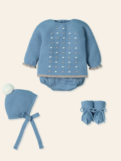 Get your little one ready for the season with our Mac Ilusion branded baby boys blue spot detail four piece set. Made with soft and comfortable fabric, this set includes a long sleeve top with spot detail, culotte shorts, a hat with white bobble detail and matching booties. Available in sizes 1 month, 3 months, and 6 months, and comes in a gift box for easy gifting. Perfect for your little bundle of joy!