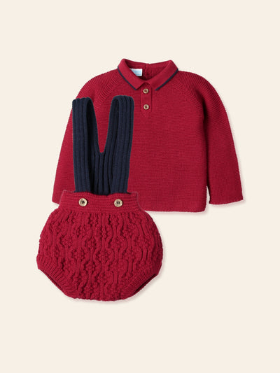 Dress your little one in style with our Mac Ilusion baby boys chunky knit red dungaree outfit. Made of high-quality chunky knit fabric, this outfit comes with a long sleeve polo shirt, finished in a scarlet red with navy straps on the dungaree. Perfect for the colder months, it's also a great Christmas day outfit and comes in a gift box. Available in sizes 3, 6, and 12 months.