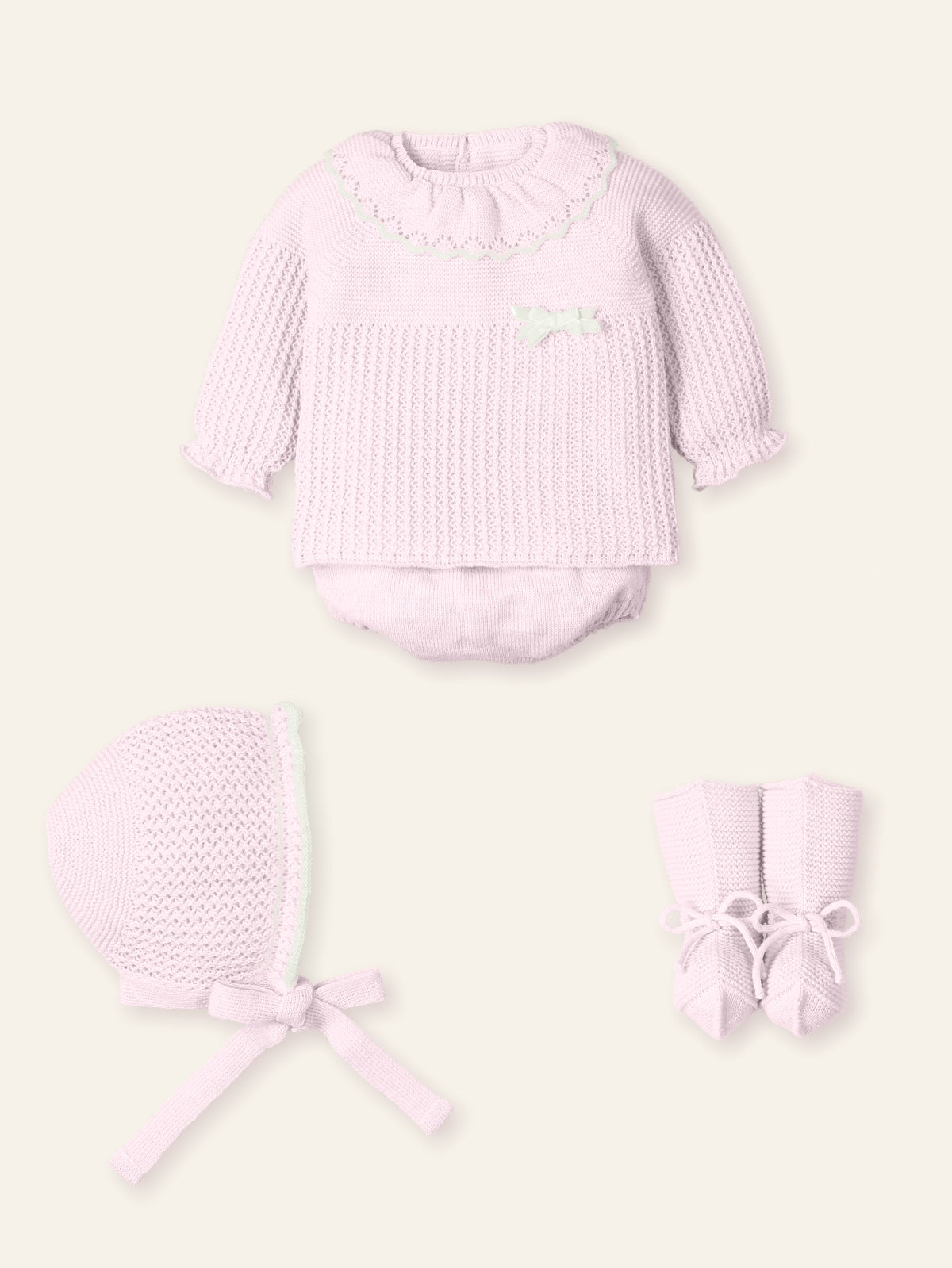 Mac Ilusión baby girls pink knitted outfit with ruffle collar, bow, jam pants, bonnet & booties