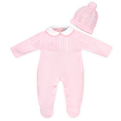 Introduce your little princess to the warmth and comfort of our baby girls pink cable knit onesie &amp; bobble hat set. Made in Portugal for Dandelion, this set features a cable and basket weave pattern with a cute bobble hat. With a 5-button fastening for easy dressing. Available in 3 sizes; newborn, 0-3 months &amp; 3-6 months.