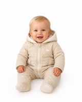 amore baby boys beige quilted snowsuit model sitting white background studio shoot heritage boutique childrenswear