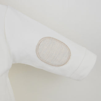 Close up of Pex Charlie boys ivory sleepsuit showing the textured oval elbow patch detail on the sleeve