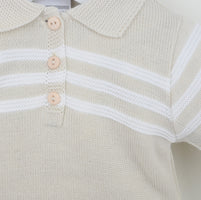 Close up of Pex Mateo boys natural knitted polo shirt showing white stripe detail and button placket