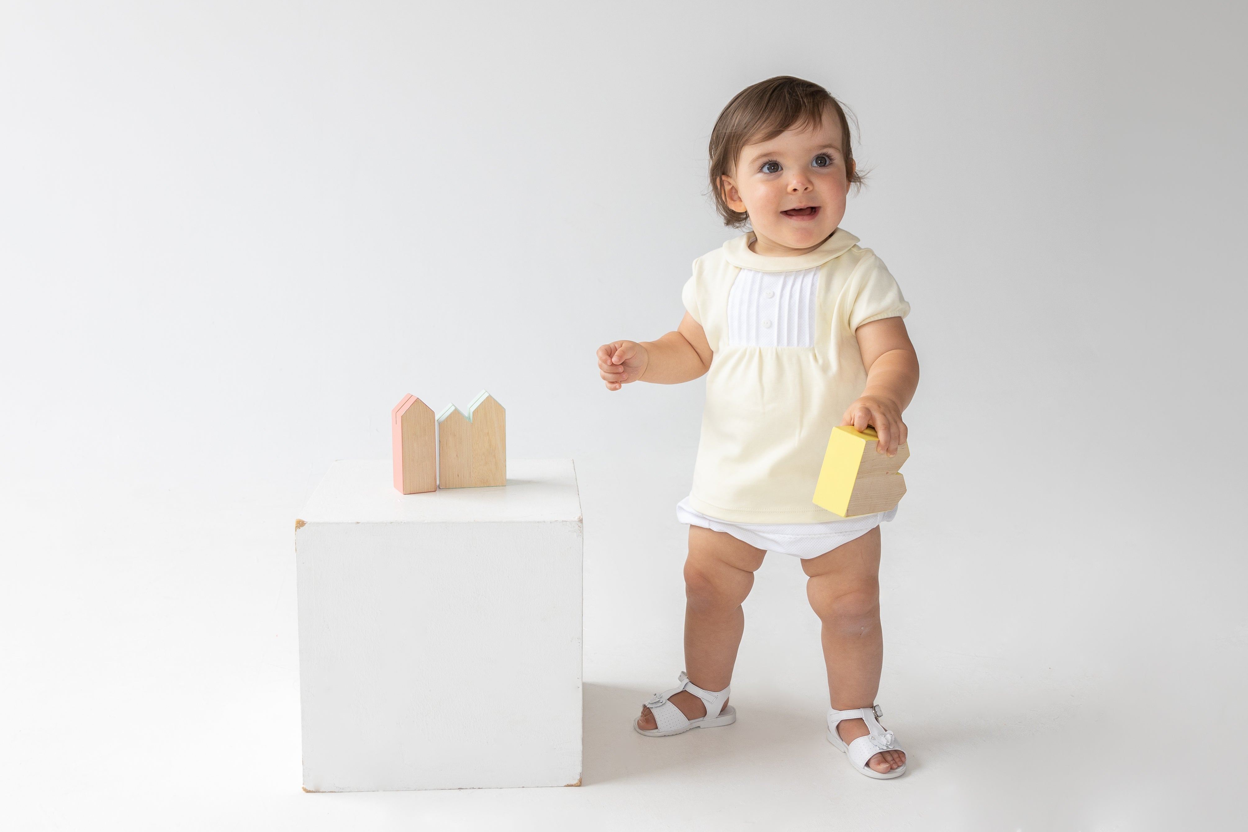 Kidz Emporium boutique kids wear brand special liquidation event - illustrative lifestyle example of traditional baby clothing heritage romper
