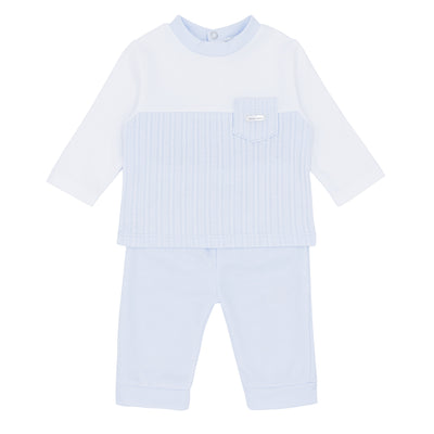 Blues Baby branded boys two piece jogger set with cable design. This boys outfit is finished in blue and white colour, it has a cable design going down the top with a small pocket to the side, and comes with trousers to match. Available in sizes 3 month up to 24 month size.  Also available in grey.