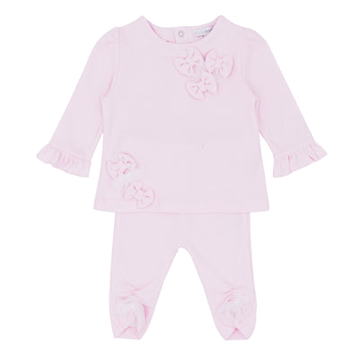 Blues Baby branded girls two piece legging set finished in baby pink colour. The top has a round neck collar, diamanté bow applique detail to the front and frilled cuffs. The leggings have a ruched gathering to the front. Available in sizes 3 month up to 24 month.