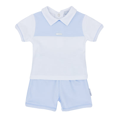Introduce your little one to summer style with our boys blue & white two piece polo T-shirt and shorts set. Made by Blues Baby, this set features a crisp white collared top with blue detailing and matching shorts. Available in sizes 3 months to 24 months, it's a perfect addition to any wardrobe.