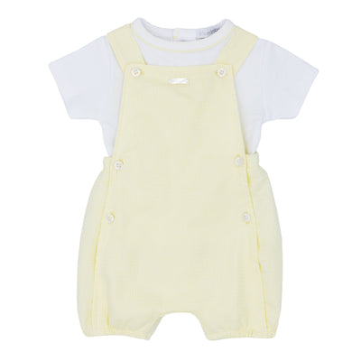 <p data-mce-fragment="1">Introduce your little one to the world of fashion with this adorable boys lemon &amp; white dungaree set from the baby &amp; children's boutique brand Blues Baby. Featuring a lemon dungaree with a button fastening and crossover detail on the back, paired with a white round neck shirt with lemon piping, this set is perfect for spring and summer. Available in sizes 1 month to 12 months.</p>