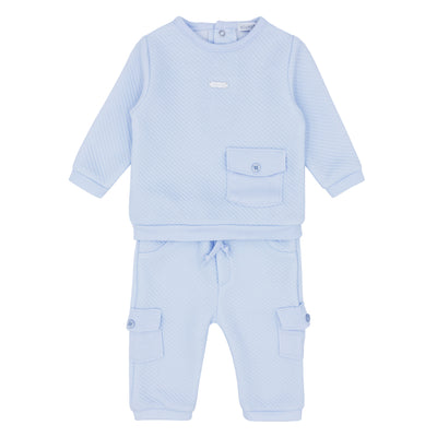 Introducing our Blues Baby two piece top and jogger set, part of our autumn winter collection. This set includes a long sleeve round neck top with a front pocket detail and adjustable waistband trousers with pockets on the legs. Available in sizes 3 months up to 4 years, it's the perfect big brother and little brother matching outfit. Style and comfort combined for your little ones!