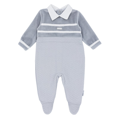 This new arrival from Blues Baby is a must-have for your baby boy. The all-in-one suit features a stylish grey colour with white stripe detail across the chest and a white stripe detail on the sleeve cuffs. The soft material and comfortable fit make it perfect for newborns, 1 month, and 3 month sizes. Also available in baby blue.