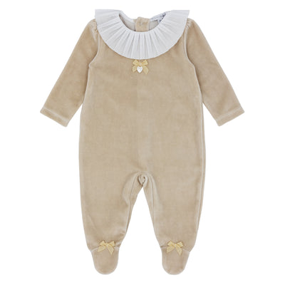 This caramel all in one by Blues Baby is from their autumn winter collection and showcases a big white frill collar. Made with soft velour fabric, it's designed to keep your baby girl warm and cosy. Offered in newborn, 1 month, and 3 month sizes, it's the ideal choice for keeping your little one snug during the season.